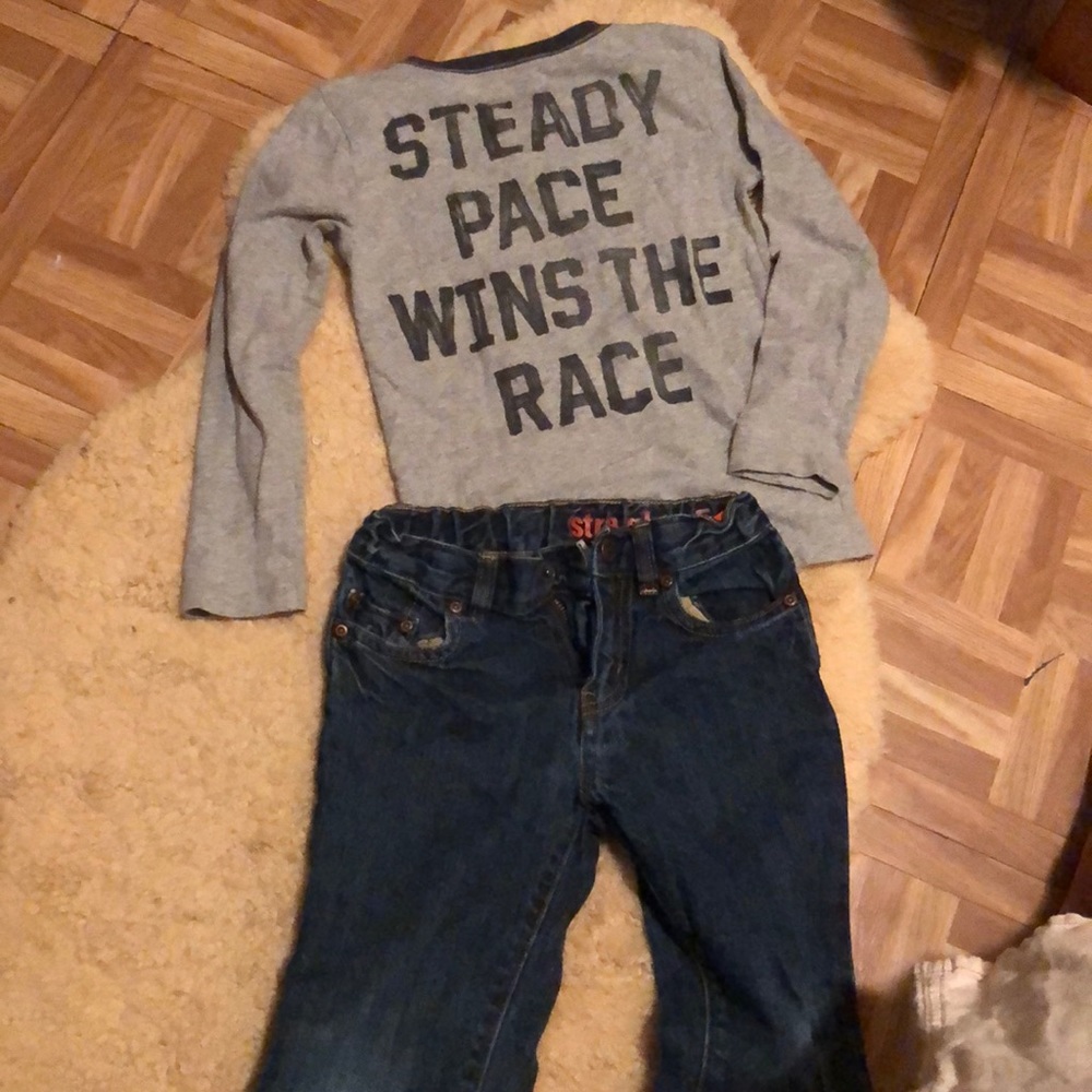 Crew cuts shirt and jeans.